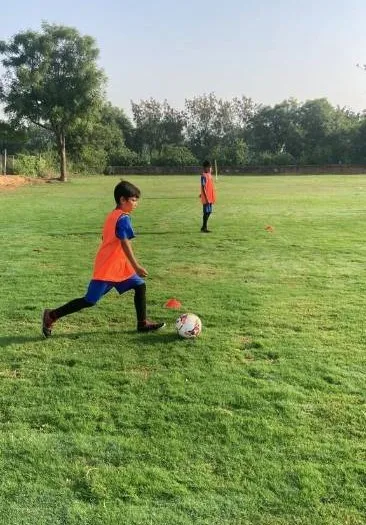 The sports dynasty student kicking football 1 1 1